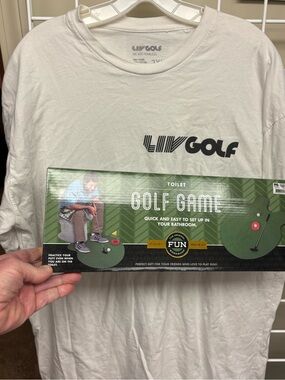 LIV Golf AND A Toilet Golf Game Together And At A Great Price. Shirt Is 2XL.